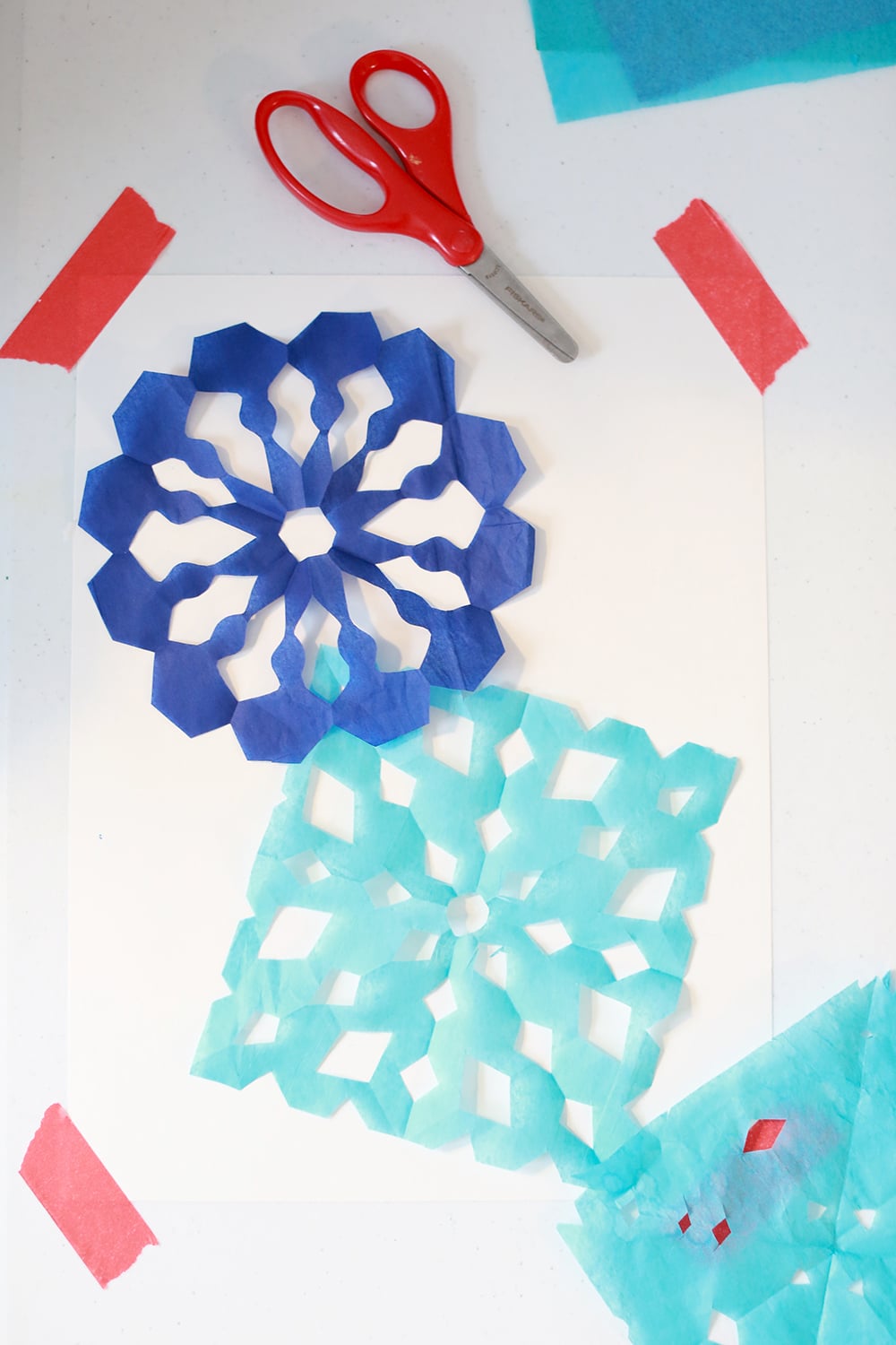 How to Make Tissue Paper Snowflakes - The Artful Parent