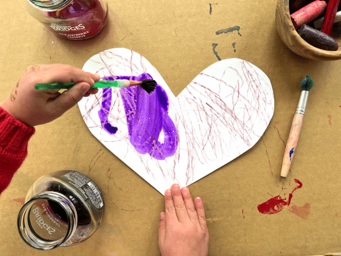 adding paint to heart