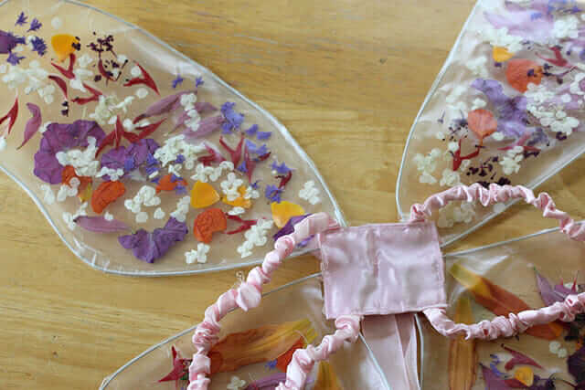 Childrens fairy wings - pressed flowers and contact paper suncatcher