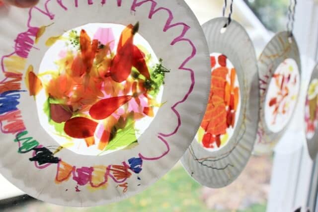 crafts with fall leaves - nature suncatchers in window