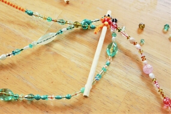 beads on garden ornament