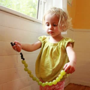 Fruit Necklaces Make a Fun Kids Snack - finished fruit necklace