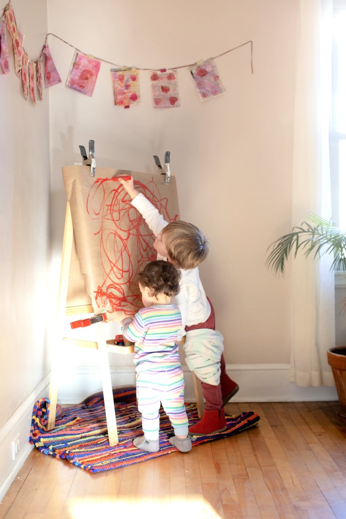 children drawing at easel