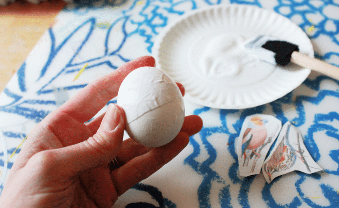 applying glue to eggs