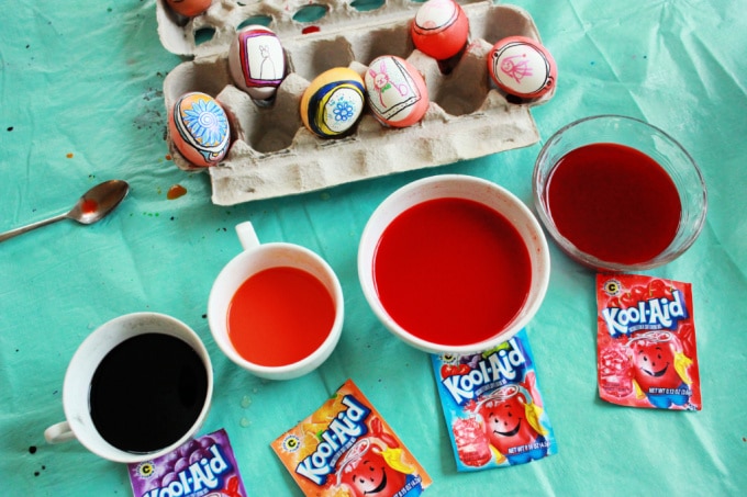 easter eggs being dyed with kool aid