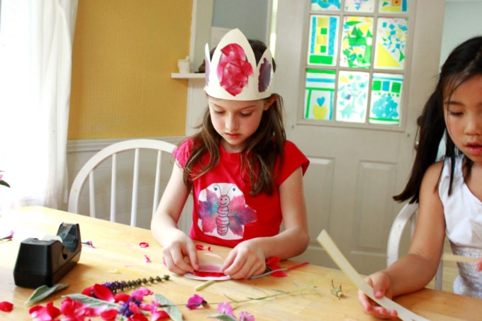 Children creating DIY flower crowns