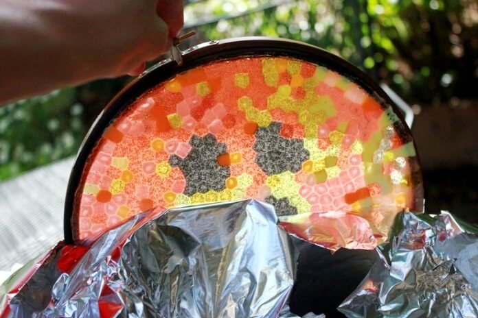 Melted Bead Halloween Suncatchers on tray - peeling foil