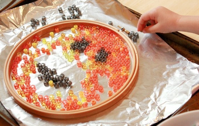 arranging beads for suncatcher