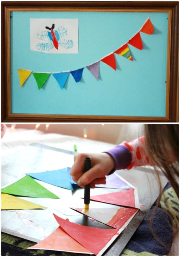 A child coloring the buntings with solid colors using melted crayons without the stained glass effect.