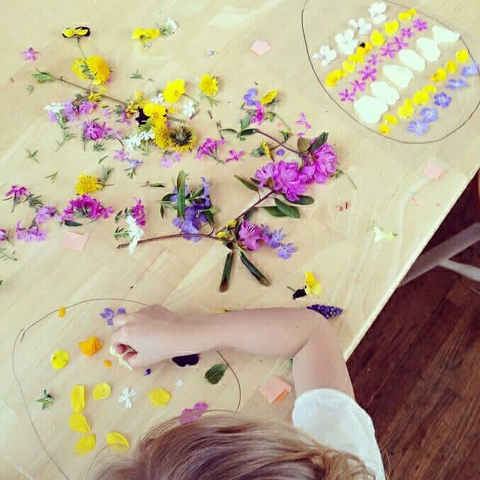 Making an Easter egg suncatcher craft with flowers