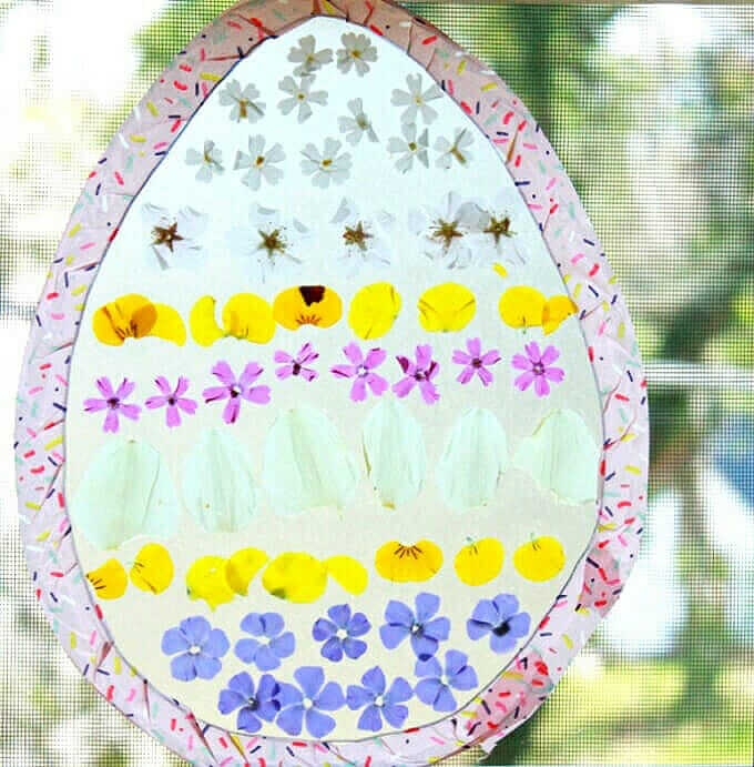 Easter egg suncatcher craft with flower petals