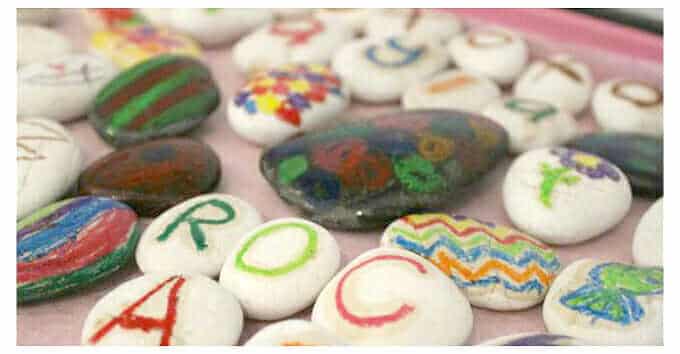 Art with Rocks: 18 Ways to Use Rocks in Kids Art – decorated crayon rocks