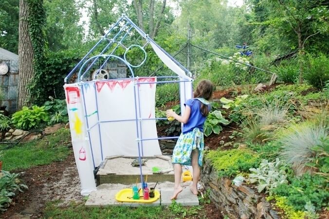 Painting the DIY Backyard Playhouse