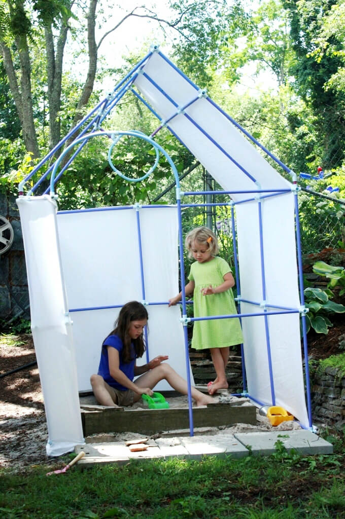 Playing in the Backyard Playhouse