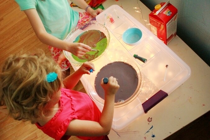Rainbow Milk Science Experiment - getting muddy