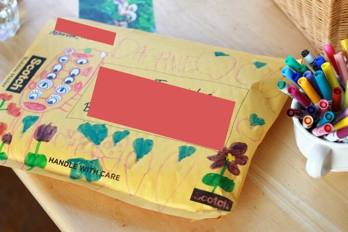Using Eye Stickers to Decorate Mailing Envelopes