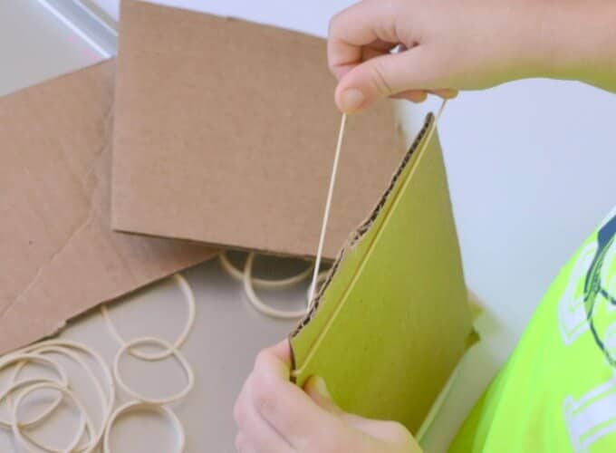Rubber Band Printing for Kids - Putting Rubber Bands on Cardboard