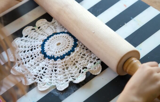 Making lace prints with crochet doilies