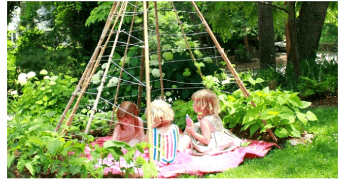 How to make a bean pole teepee that is highly functional as well as attractive. This wonderful living garden teepee doubles as a kids' fort or hideaway.