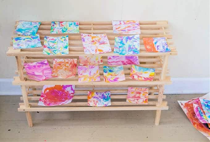Drying rack with marbled paper onit