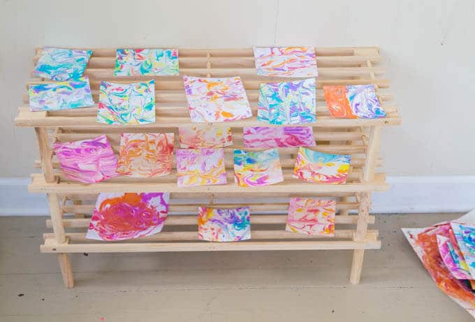 DIY Marbled Paper Drying on Shoe Rack