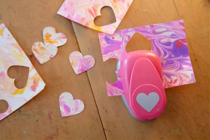 hearts cut out of marbled paper
