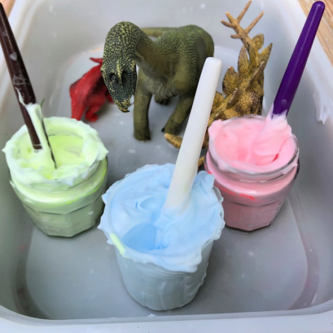 painting dinos with foam paint