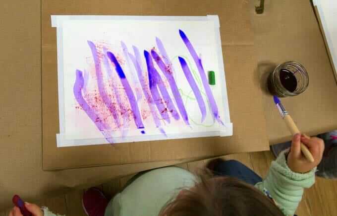 Watercolor Resist Art with Toddlers - Adding Watercolor Paint over Oil Pastel DRawing