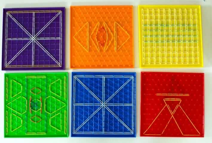 Geoboard Art spread out on coffee table