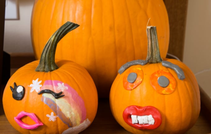 clay faces on pumpkins