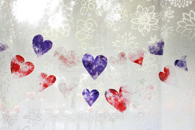 crayon heartstrings in window for valentine's day craft ideas