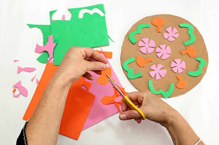 Cutting out craft foam for an easy printmaking idea - mandala pizza prints