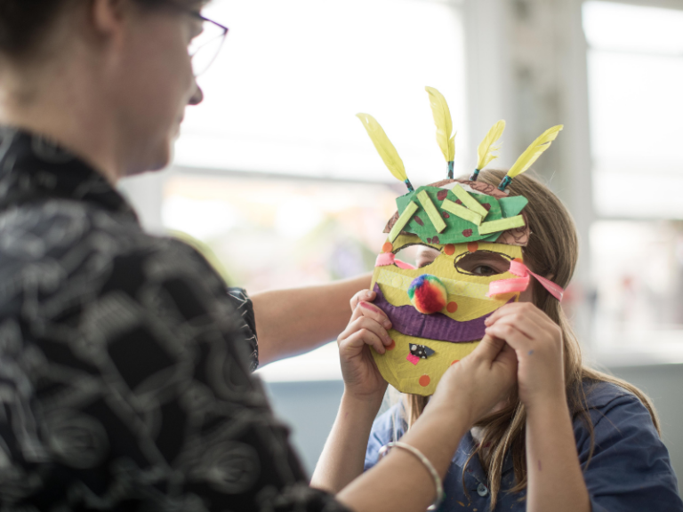 adding elastic to cardboard mask