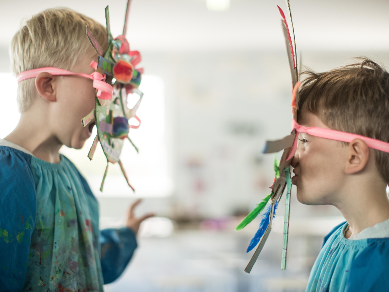 kids with cardboard masks