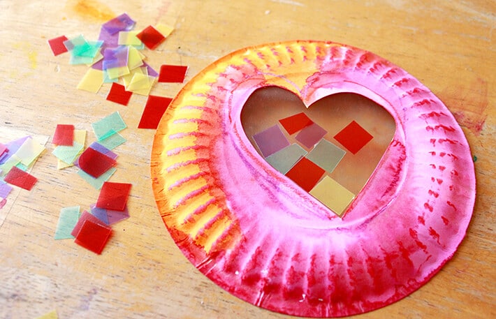 Easy Valentine Crafts - assembling the Valentine's Day Suncatchers