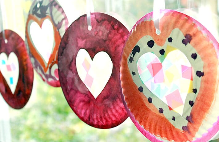 Easy Valentine Crafts - Valentine's Day Suncatchers hanging in a sunny window