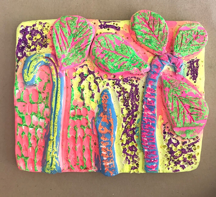 Colorful clay relief tiles for kids