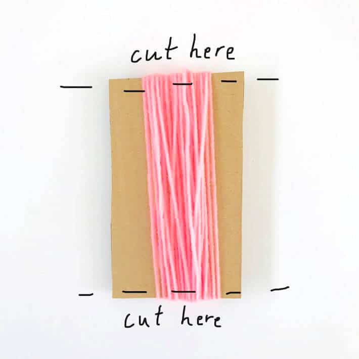 How to cut yarn wrapped around cardboard