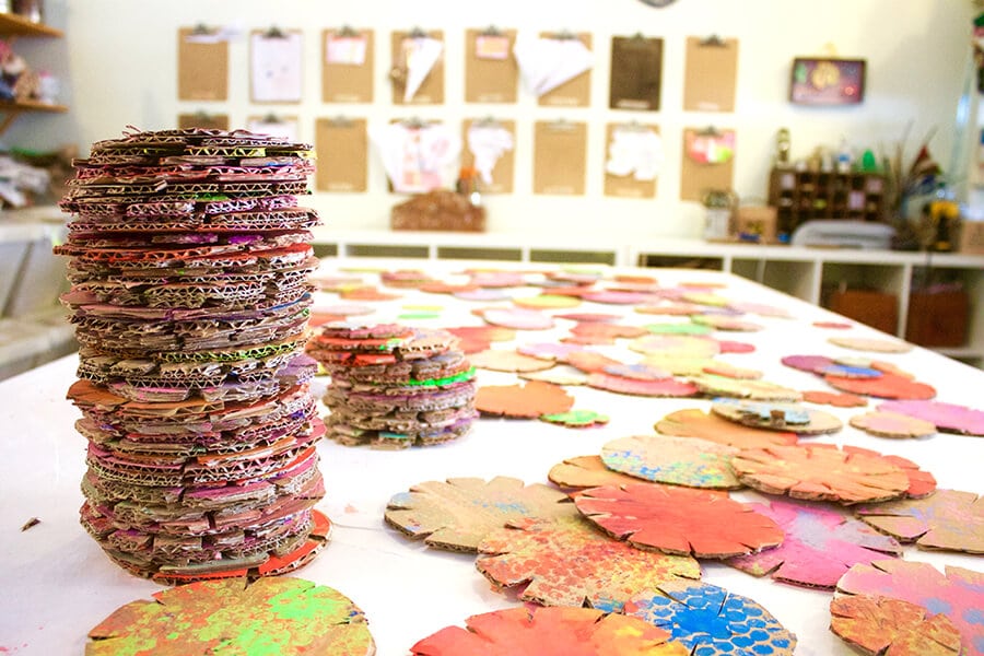 Painted cardboard building discs for kids