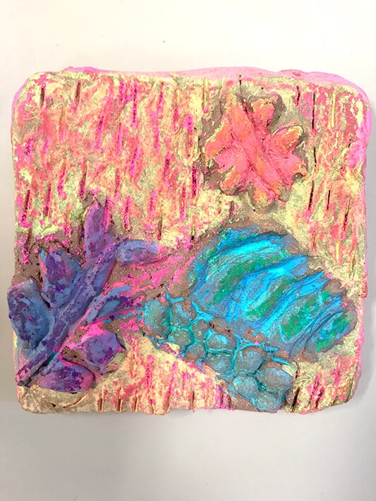 Painted clay relief tiles