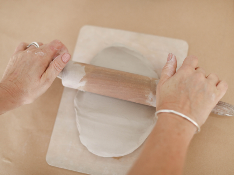 rolling out clay
