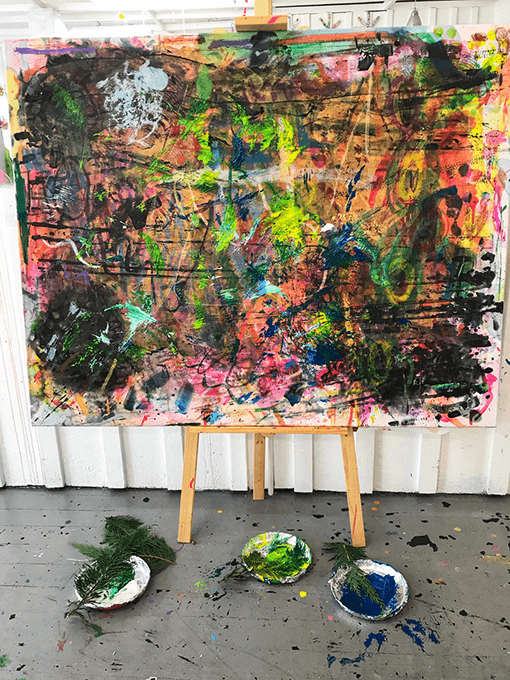 Large Canvas with branches: The last layer of our evolving canvas painted by kids 5 & under.
