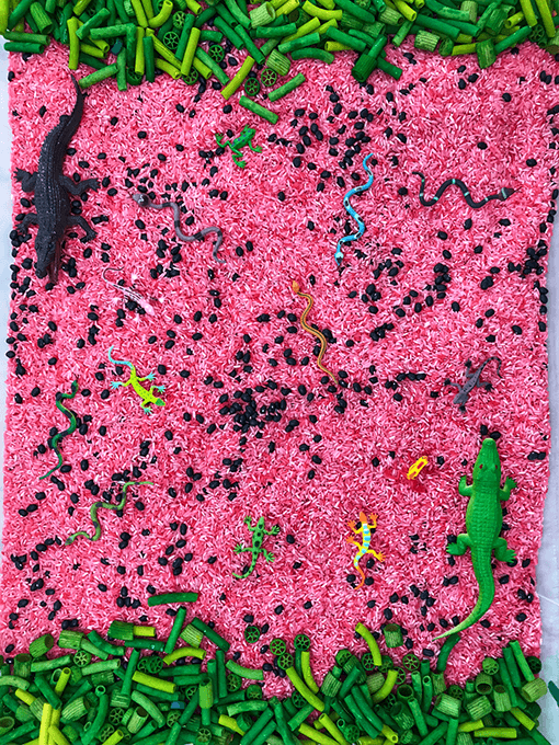 Watermelon Sensory Bin: Watermelon Sensory Bin with dyed rice, black beans, and green noodles!