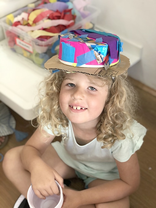 Child with DIY hat