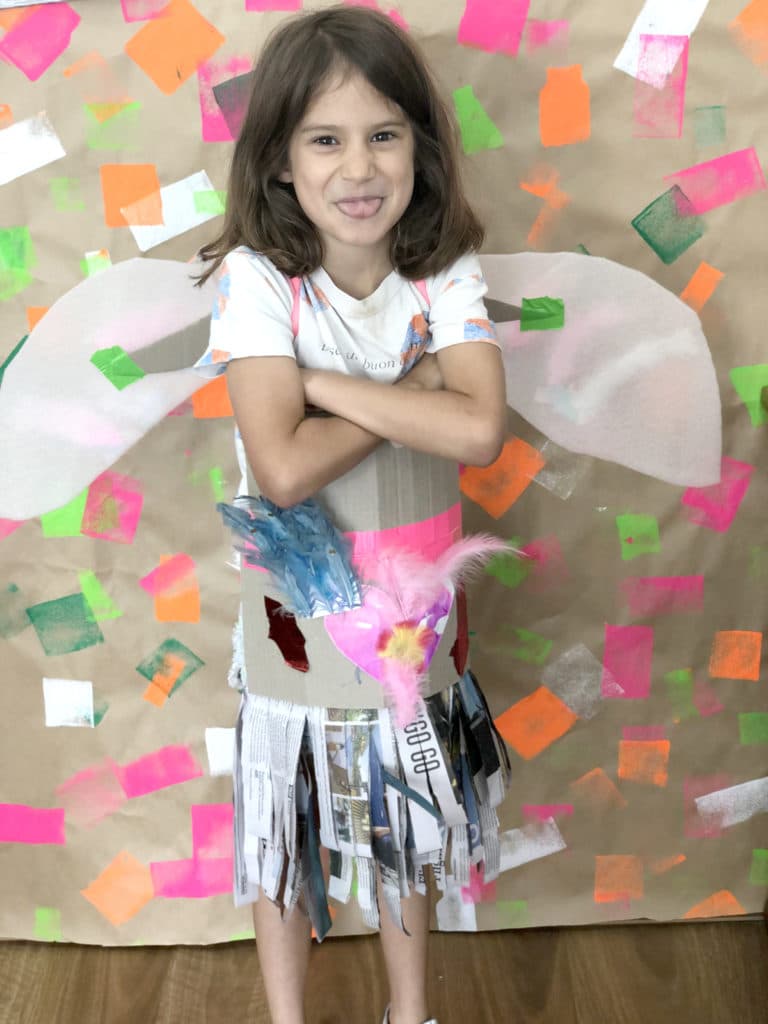 Child wearing dress & wings costume for kids