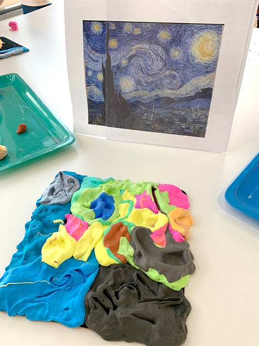 A printout of Starry Night and a painting with clay activity