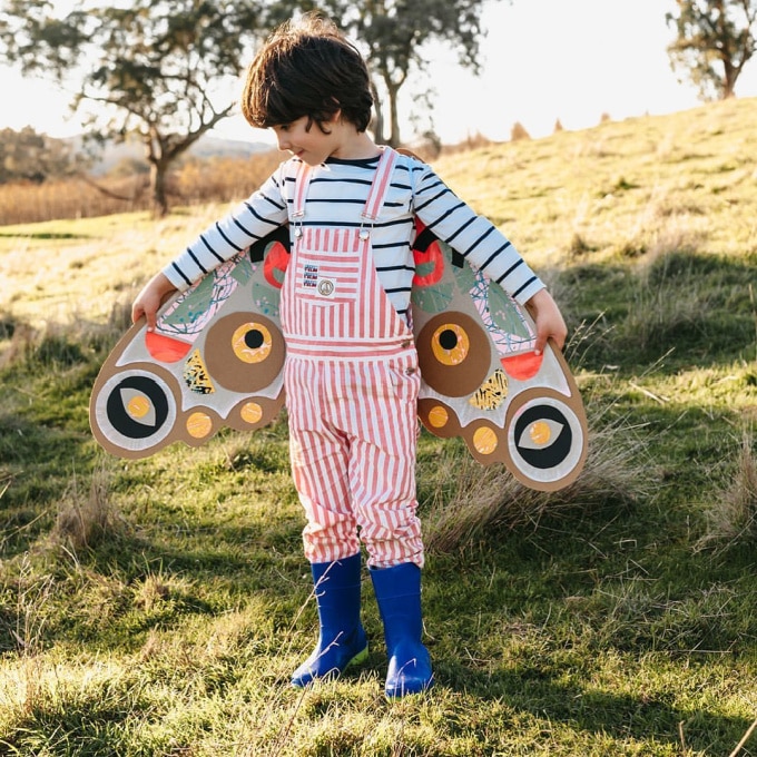 Child dressed as butterfly from minimadthings