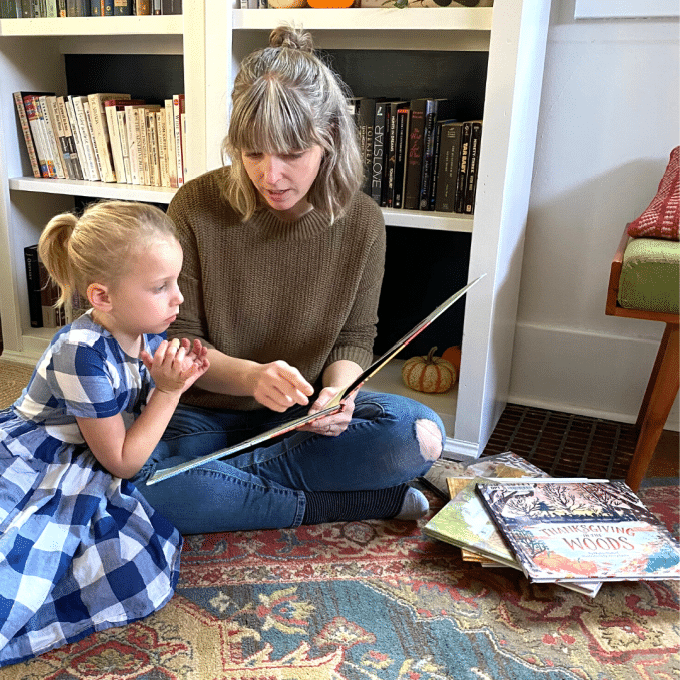 Family reading from seasonal home library