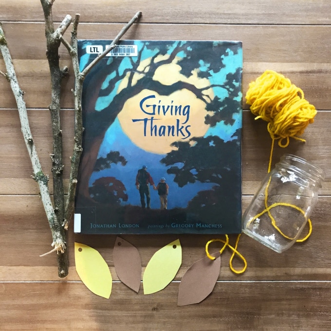 Giving Thanks book with tree branch, jar, yarn and leaves