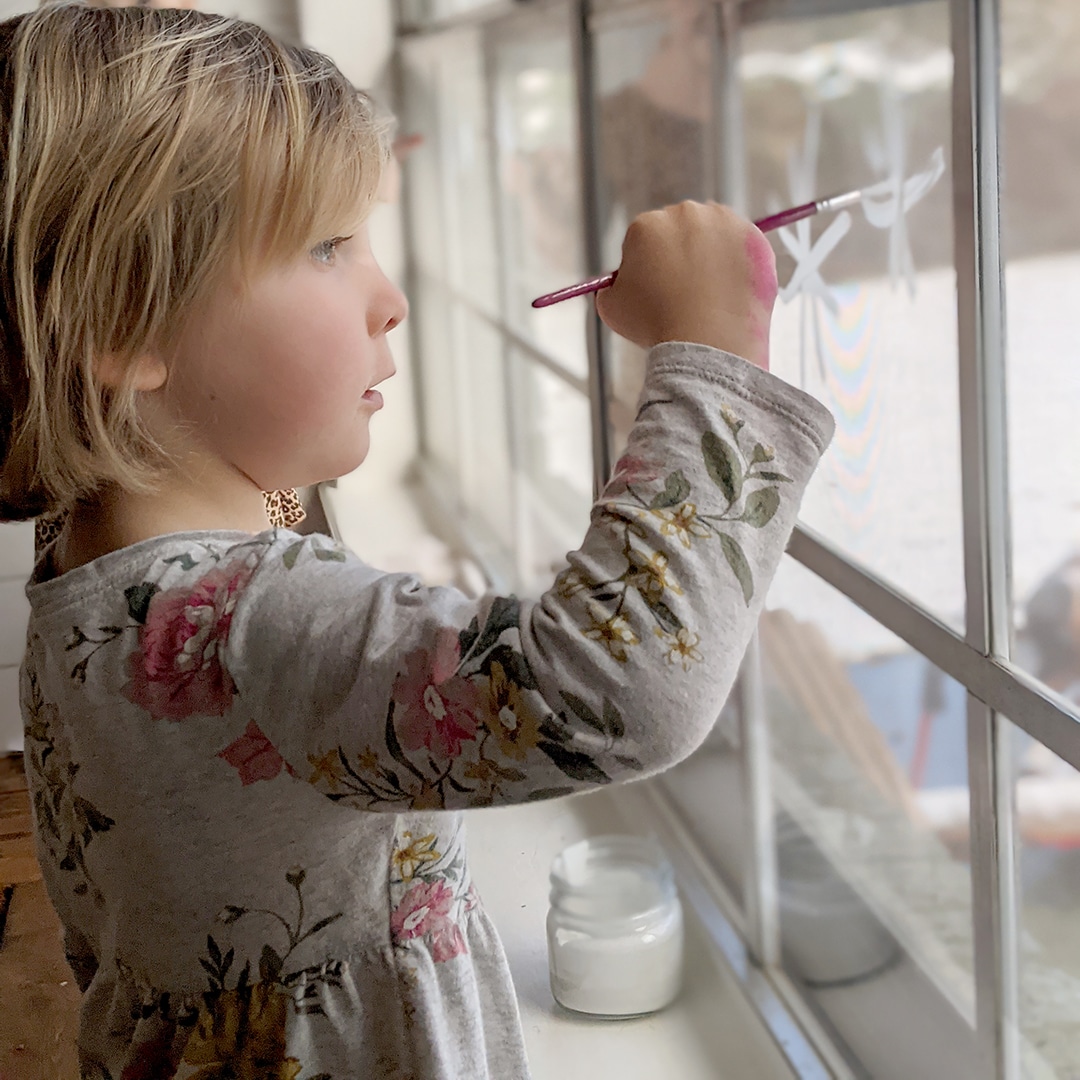 Winter painting on windows with Scissor Tales Play